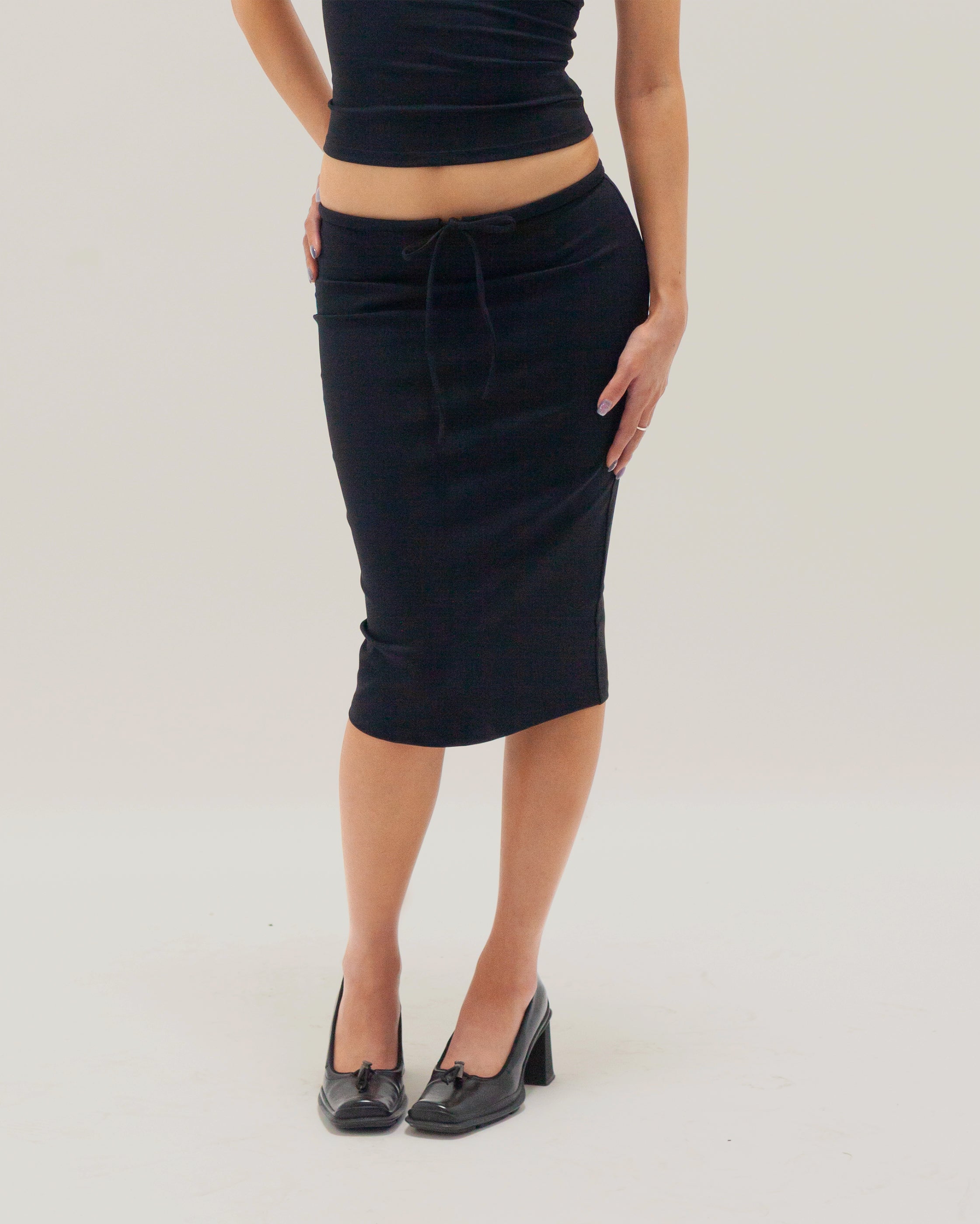 UNIFORM MIDI SKIRT